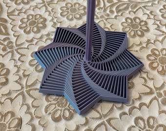 Juguete antiestrés de estrella con asa