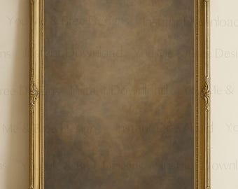 May include: A gold-colored ornate picture frame with a brown textured background. The frame is sitting on a wooden surface.