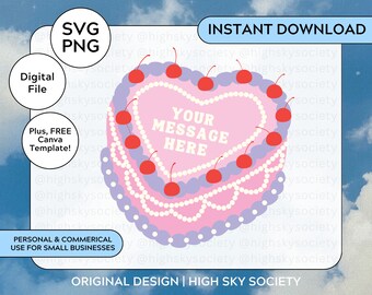 Può includere: Una torta rosa a forma di cuore con glassa viola e dettagli di perle bianche. La torta è decorata con ciliegie rosse e ha il testo "YOUR MESSAGE HERE" al centro.
