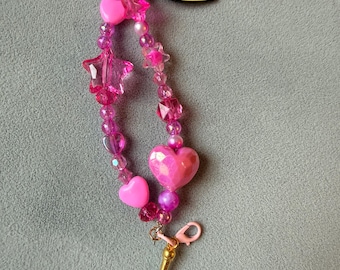 セーラームーン ピンクの携帯ストラップ、うさぎ＆ルナ ビーズ付きストラップ