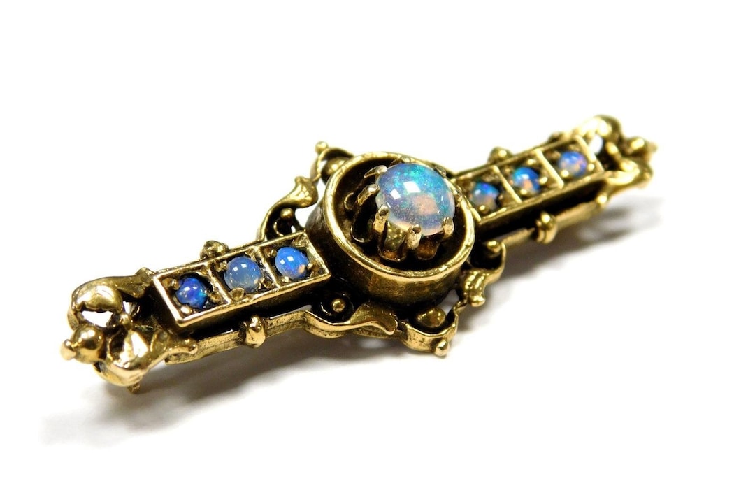 Vintage 12kt gold brooch with opal stones