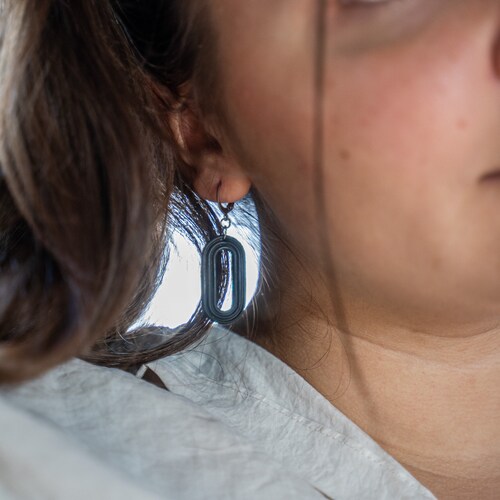 Classic earrings in a shops rocking-modern look 