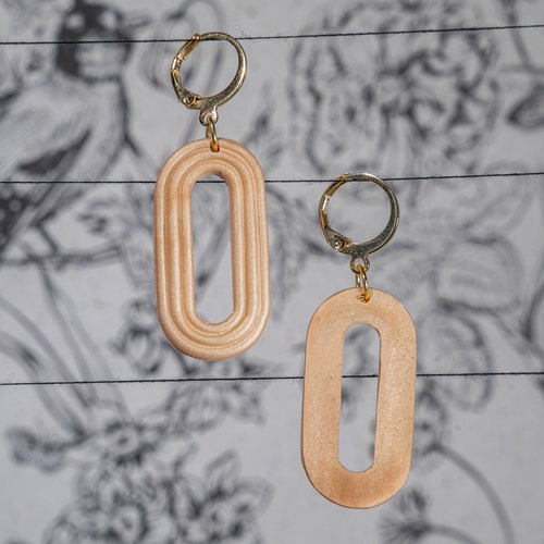 Classic earrings in a shops rocking-modern look 