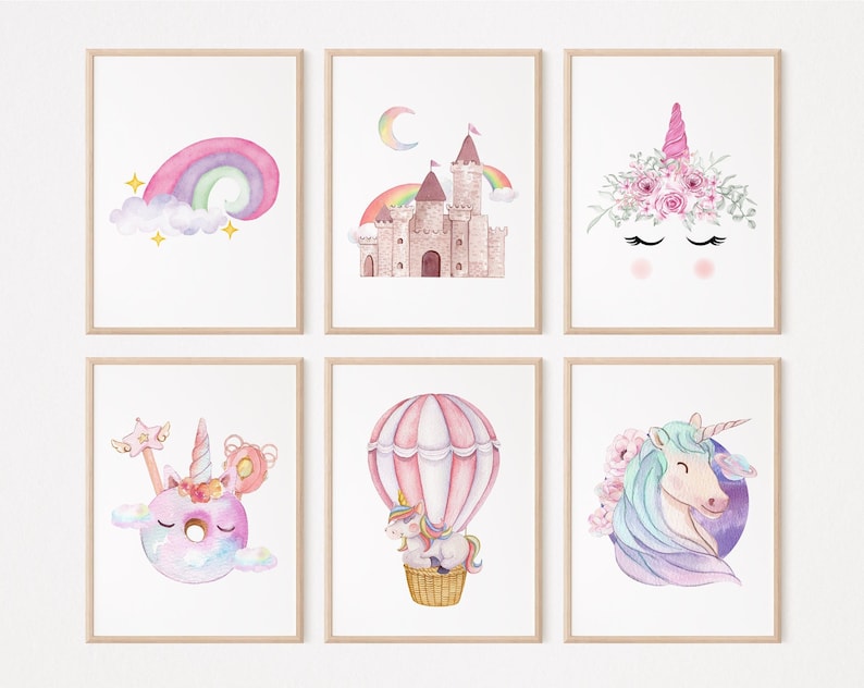May include: Six framed watercolour prints with unicorn and fantasy themes. The prints depict a rainbow, a castle with a rainbow, a unicorn face with floral accents, a unicorn donut, a unicorn in a hot air balloon, and a unicorn with flowers.