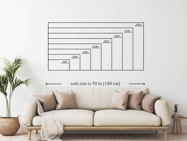 a living room with a large sofa, a potted plant, and a wooden side table. The sofa is described as being 70 inches (180 centimeters) long.