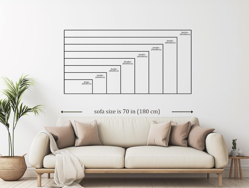 a living room with a large sofa, a potted plant, and a wooden side table. The sofa is described as being 70 inches (180 centimeters) long.