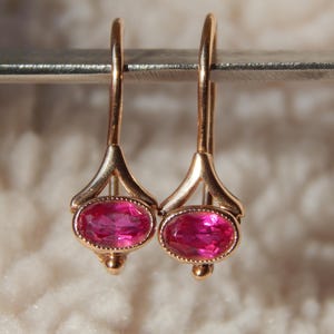 Vintage Soviet Union earrings in 14-carat 583 gold with rubies (lab-grown) .