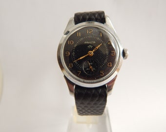 Reloj mecánico vintage Raketa de la década de 1960 Reloj soviético para hombre Raketa.