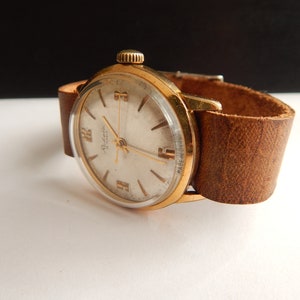 Reloj mecánico vintage Raketa, caja chapada en oro AU 20 Micron, reloj soviético Raketa para hombre de la década de 1970. imagen 5