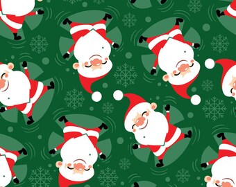 Papá Noel navideño haciendo ángeles de nieve sobre tela verde 100% algodón.