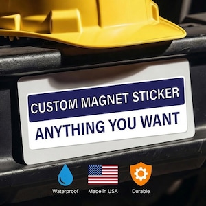 May include: A rectangular custom magnet sticker with a white background and a dark blue horizontal stripe. The text CUSTOM MAGNET STICKER is printed in white on the blue stripe, and the text ANYTHING YOU WANT is printed in dark blue below.