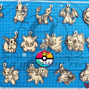 Pacote 1/13 2024 chaveiros pokemon (16 chaveiros svg,png,dxf,pdf,ai,lightburn)