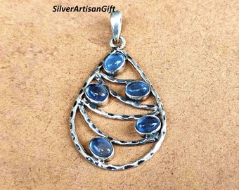 Blue Topaz Pendant: Oval 925  Sterling Silver Bezel Setting