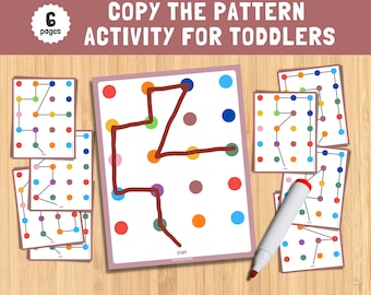 May include: A printable activity for toddlers featuring six pages with colorful dot patterns. The goal is to copy the pattern by tracing the lines connecting the dots with a marker. The image shows a completed page with a red line tracing the pattern.