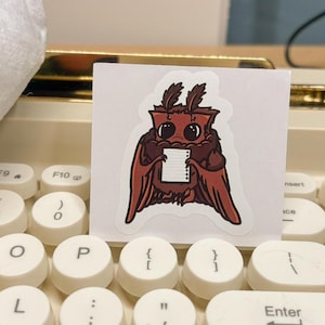 Cute Mothman Book Sticker – Studious Cryptid with Notes | Vinyl Paranormal Sticker for Book Lovers, Journals & Cozy Aesthetics