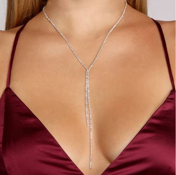 Silver Necklace with Big Rhinestones on Neck and Breast of Girl