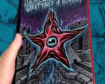 H.P. Lovecraft book with unique hand painted cover. Signed by artist