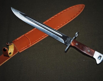 Hunting knife with a long straight strong blade.