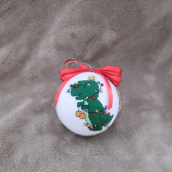 Christmas ornament with a dragon and colorful string lights