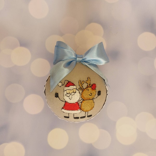 A ball with an image of Santa and a reindeer