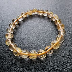 Golden Rutilated Quartz Bracelet Grade AA 7-8mm