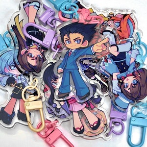 PREORDER - AA keychains + stickers