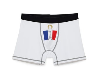 Olympische Spiele 2024 in Paris vorne und Paris-Flagge mit Eiffelturm hinten Herren-Boxershorts (AOP)