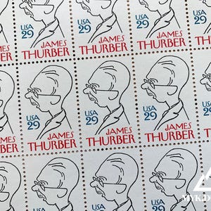 May include: A sheet of 10 US postage stamps featuring a black and white illustration of James Thurber. Each stamp has the text "USA 29" and "JAMES THURBER" printed on it.
