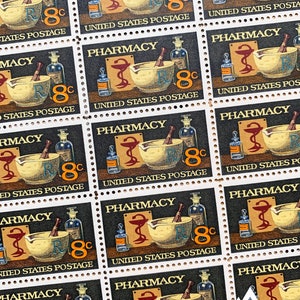 May include: A sheet of eight US postage stamps featuring a pharmacy theme. Each stamp depicts a mortar and pestle, a snake wrapped around a staff, and the text "Pharmacy" and "United States Postage". The stamps are all 8 cents.