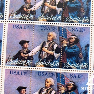 May include: A sheet of vintage postage stamps featuring the "Spirit of '76" artwork. Each stamp depicts a scene from the American Revolutionary War and features the text "Spirit of '76" and "USA 13c".