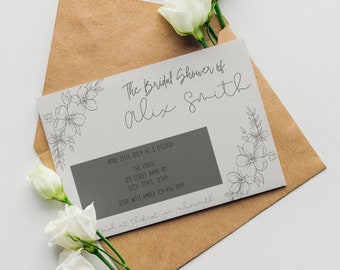 May include: A light gray rectangular invitation card with dark gray floral line art on the sides and text reading The Bridal Shower of Alix Smith, April 15th, 2024 at 2 o'clock, The Lodge, 123 Street Name Rd, City, State, 12345, RSVP with Amber 123-456-7891.