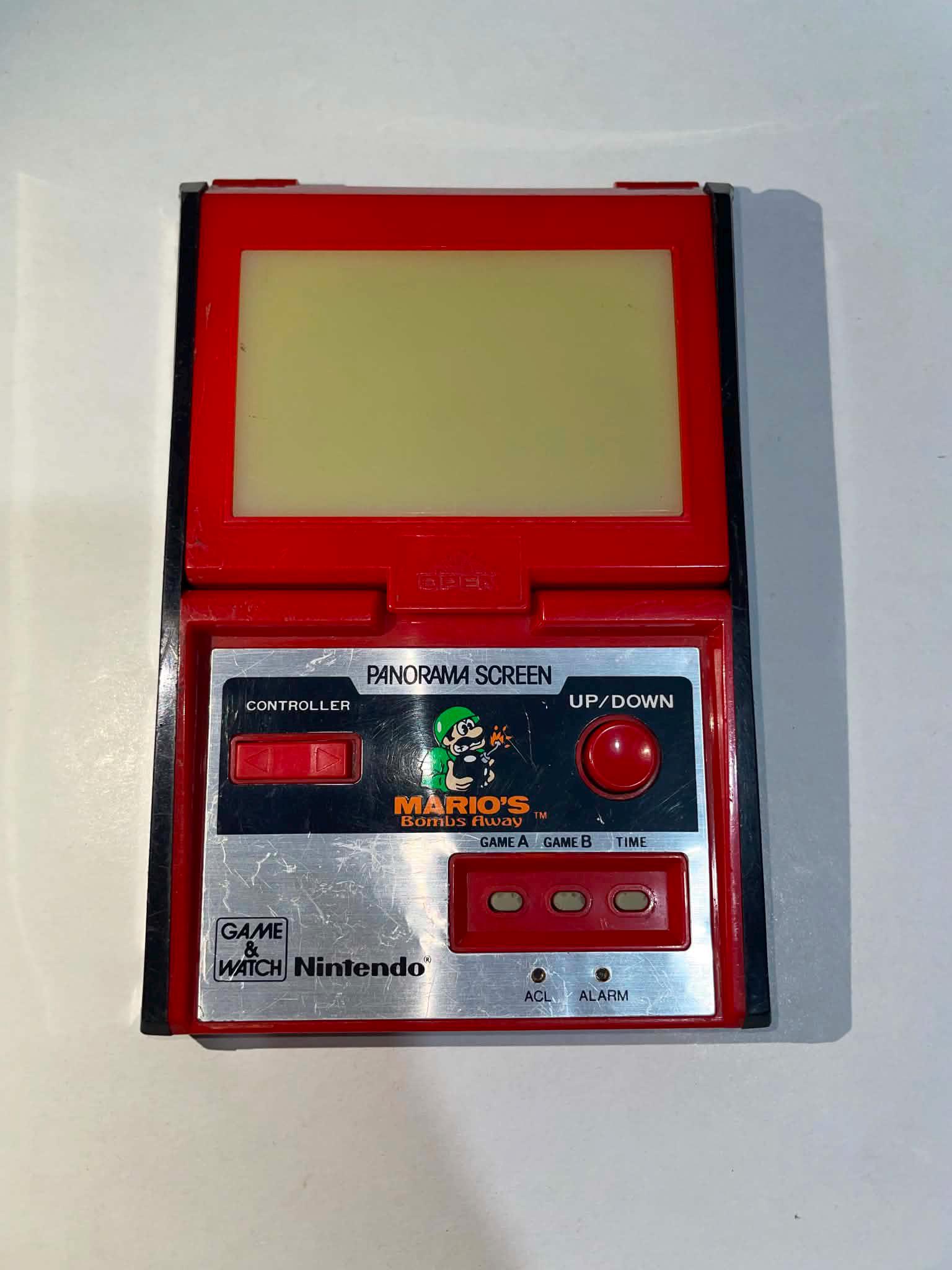ゲームワォッチパノラマスクリーンマリオ マリオの爆弾投下 パノラマスクリーン ゲームウォッチ 1983年製 TB-94