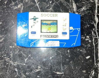 Gioco elettronico portatile LCD Sunwing SG-861 Soccer, funzionante.
