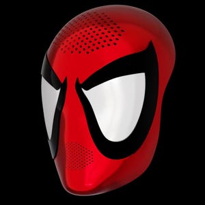 Op de afbeelding: Een rood en zwart plastic masker met een spinnenwebontwerp. Het masker heeft een wit ooggebied en een getextureerd oppervlak.