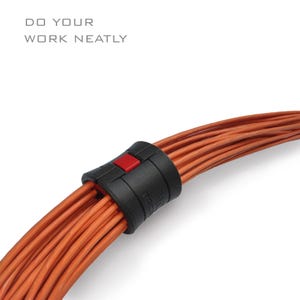 May include: A black cable organizer with a red button secures a bundle of orange cables. The text "DO YOUR WORK NEATLY" is in the upper left corner. The image is on a white background.