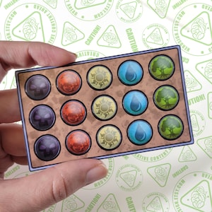 May include: A close-up of a game board with 16 circular spaces. Each space has a different colored token, including black, red, yellow, blue, and green. The tokens are arranged in a grid pattern.