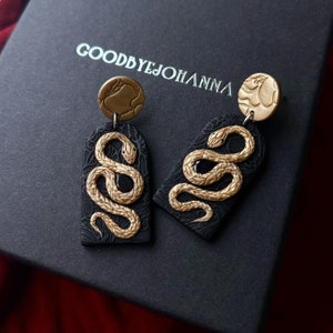 reputation-inspired handcrafted gold snake & garnet semiprecious stone polymer clay arch statement earrings, punk alt dark jewelry serpent