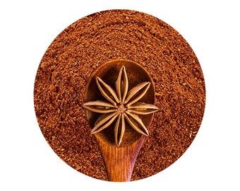 May include: A wooden spoon filled with ground cinnamon and topped with a star anise.