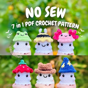 May include: Seven white crochet mushroom figures, each with a different hat design, including a frog, bee, axolotl, strawberry, cowboy hat, and wizard hat. The text "NO SEW 7 in 1 PDF CROCHET PATTERN" is displayed above the figures.