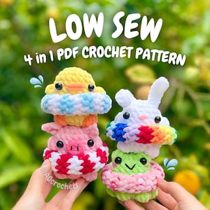 May include: Four crocheted amigurumi animals: a duck, pig, bunny, and frog. The duck has a yellow head and blue and white cloud-like body. The pig is pink with a red and white collar. The bunny is white with a rainbow cloud. The frog is green and pink. Text reads "LOW SEW 4 in 1 PDF CROCHET PATTERN".
