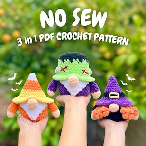 May include: Three handmade crochet gnome figures in Halloween colors. One is orange and yellow, one is purple and green, and one is black and purple. The text "NO SEW 3 in 1 PDF CROCHET PATTERN" is displayed above the gnomes.