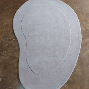Irregular shape ivory kidney shape 8x10 modern abstract 100 % wool tufted oval shape area rug  for bedroom living room office 9x12 10x14 .