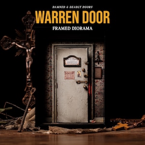 May include: A framed diorama titled DAMNED & DEADLY DOORS WARREN DOOR. The diorama features a white door with signs reading THE WARRENS OCCULT MUSEUM DEMONOLOGY WITCHCRAFT and DANGER DO NOT TOUCH ANYTHING. A crucifix stands to the left of the frame.