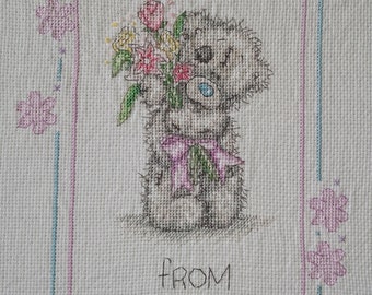 Complete, bespoke cross stitch of grey bear.