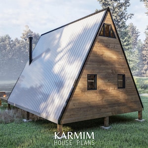 May include: A wooden A-frame cabin with a metal roof, two windows, and a chimney. The cabin is on stilts and surrounded by green grass.
