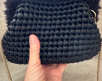Hand-crocheted leather-look clutch bag with a touch of plush, Unique design handmade pouch bag
