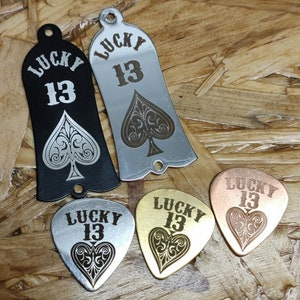 Custom laser engraved guitar truss rod cover