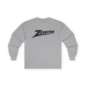May include: A heather grey long-sleeve t-shirt with a black graphic of the word "ZENITH" in a stylized font.