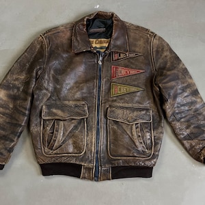 Blouson d'aviateur en cuir Chevignon vintage 1957 « Thornes » marron