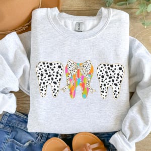 Dentist Teeth Girly Bow Sweatshirt, Cute Dental Hygienist Sweater, Valentine gift For Dentist, Dental Assistant, Dental Hygienist Gift